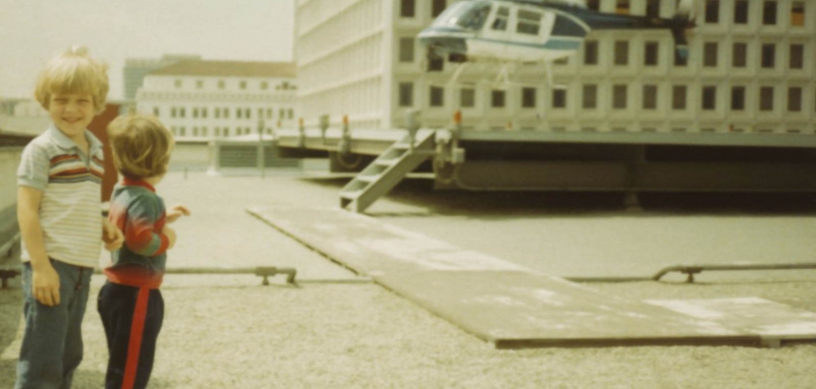 Vintage photo of a helicopter on a building rooftop